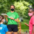 GOTR coach and girls with masks on