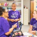 GOTR coaches talking to GOTR girl