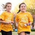 Two GOTR girls running